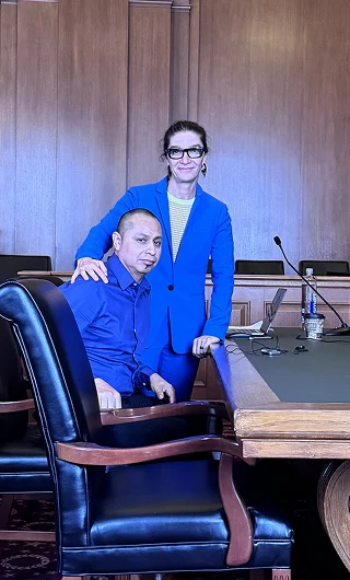 Lina Stillman and her client in the courtroom.