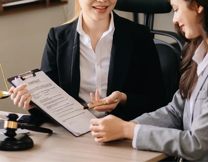 Attorney presenting a document for a client